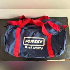 Blue and Red Duffel Bag